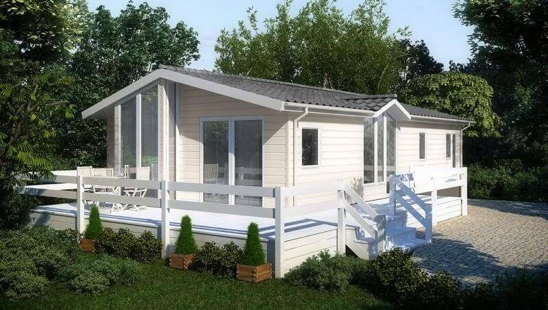 Kleines Ferienhaus mit Veranda und einer Kerrafront Fassade in der Farbe creme.